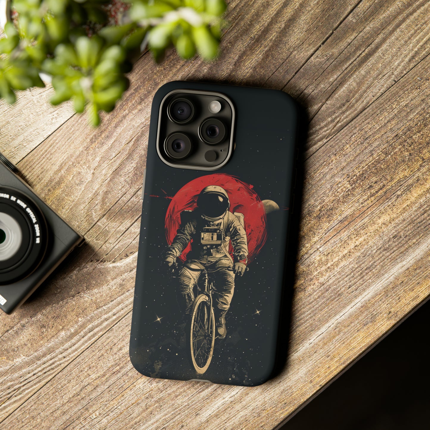 Astronaut Riding a Bike in Space Phone Case