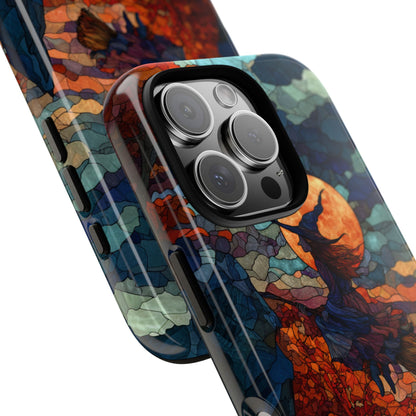 Phone case with artistic design of a witch on a broomstick against a moonlit sky.